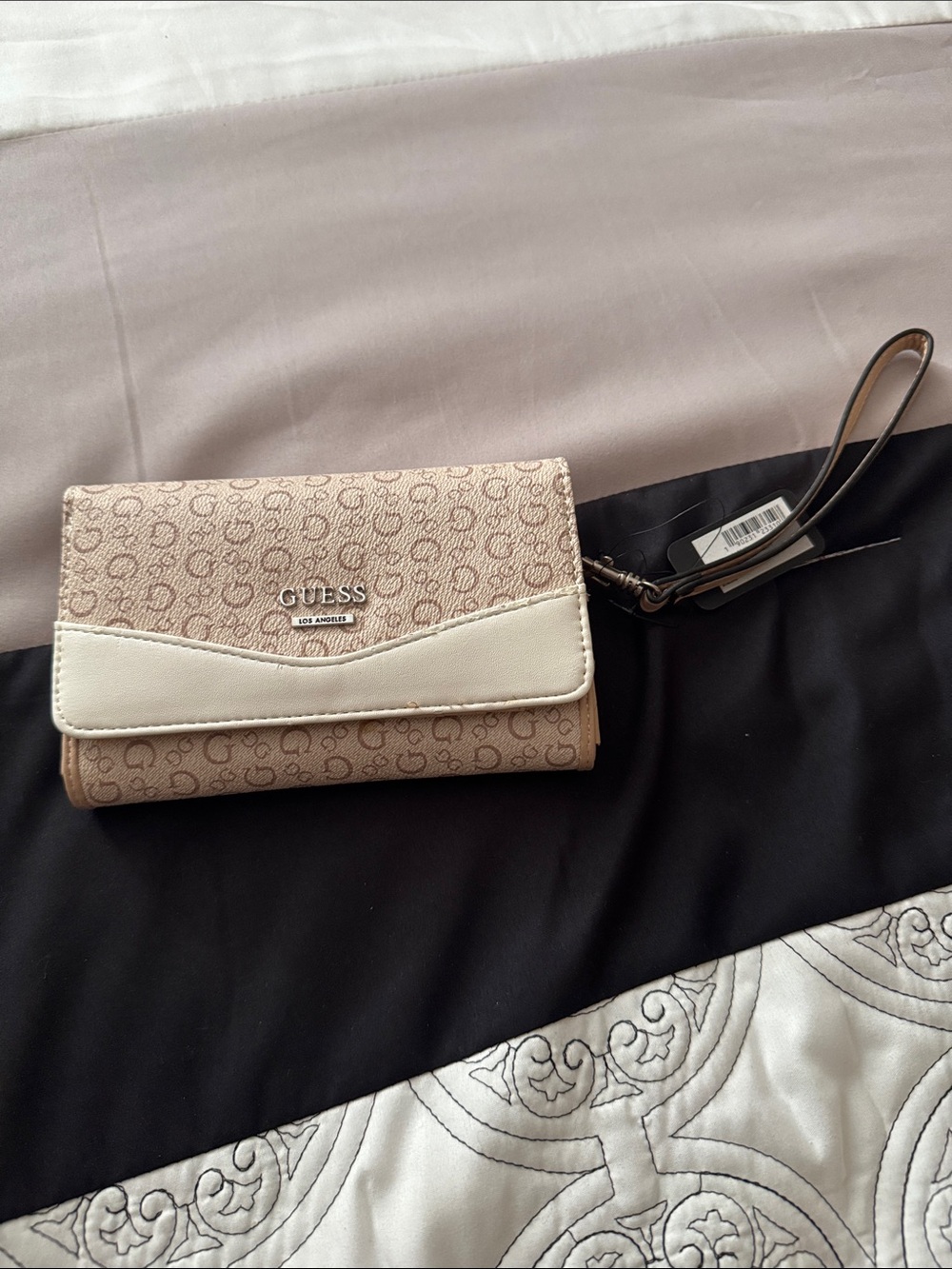 GUESS Tan Monogram Wristlet with Cream Trim